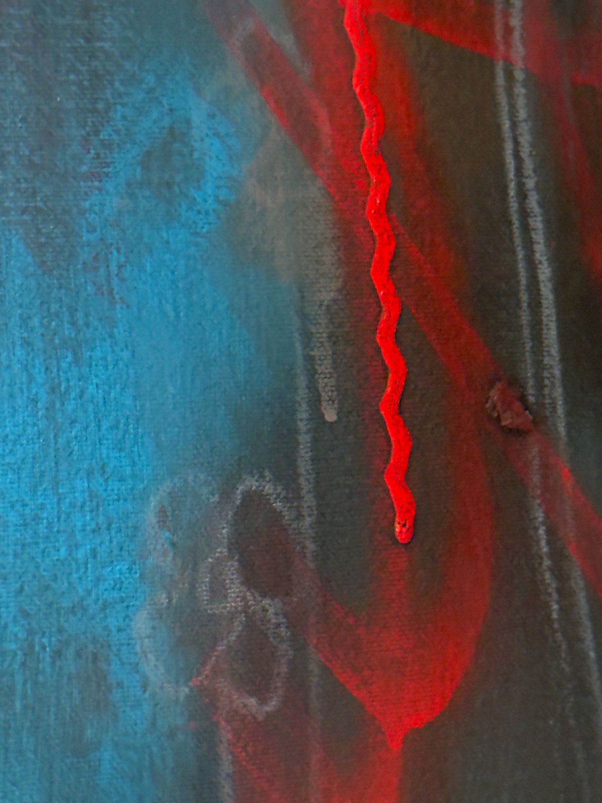 Amani detail: red aerosol line and raw canvas texture